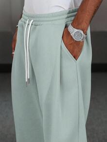 Manfinity Hypemode Quần nỉ ống rộng cạp rút cho nam Quần nỉ ống rộng Quần nỉ ống rộng Quần nỉ ống rộng Quần jogger ống rộng cho nam Quần baggy Quần baggy đen Y2k Quần nỉ cỡ lớn Quần nỉ cho nam Quần nỉ ống rộng cho nam Quần nỉ Pro Club Quần nỉ ống loe cho nam - Màu xanh Bạc hà - Xem 4