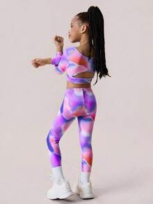 SHEIN Zestaw odzieży sportowej dla młodych dziewcząt, kolorowy wzór, jasny i żywy, bluzka z długim rękawem i wycięciem na plecach + komplet spodni, odpowiedni do ćwiczeń gimnastycznych, codziennego noszenia i na nieformalne wyjścia