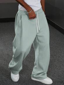 Manfinity Hypemode بنطلون رياضي واسع الساق للرجال...