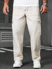 Manfinity CasualCool 米色男士抽绳腰带工装口袋休闲宽松裤 男士宽松直筒休闲裤 米色裤子 男士工装裤 白色工装裤 男士街头风裤子 - 米色 - 查看 4