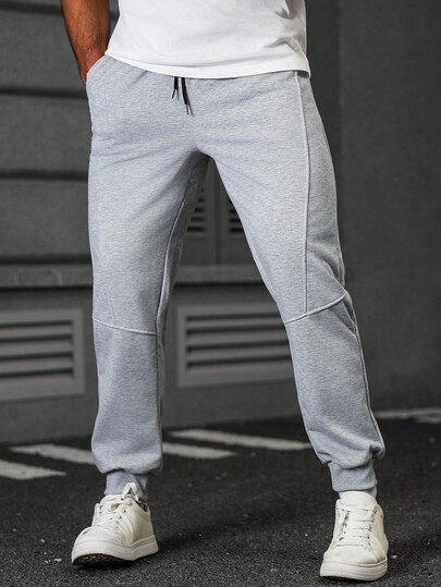 Manfinity CasualCool Pantaloni sportivi casual minimalisti da uomo con vita con cordoncino e tasche inclinate, pantaloni casual e maturi di colore grigio, in tessuto morbido e lavorato a maglia, pantaloni sportivi con tasche, comodi pantaloni sportivi da corsa e fitness, con polsini a costine, joggers grigi da uomo, pantaloni sportivi da uomo grigi