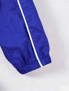 Tween-Mädchen Kapuzenjacke mit reflektierenden Streifen, die im Dunkeln leuchtet