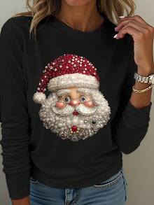 EMERY ROSE تي شيرت كاجوال بياقة مستديرة وأكمام طويلة للسيدات مطبوع عليه صورة سانتا كلوز المرصعة باللؤلؤ - الأسود - مشاهدة 1