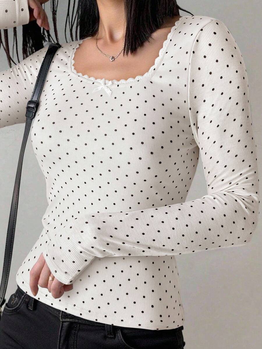 SHEIN 少女基础款休闲百搭白色针织圆领宽松长袖蕾丝蝴蝶结T恤上衣，返校季，可爱百搭，适合秋冬季日常穿着、街头风、居家圣诞节舒适秋冬装扮，适合新年、日常穿着、庆祝活动，秋冬季轻松舒适，秋冬季叠穿单品，时尚少女之选。 - 黑色 - 查看 1