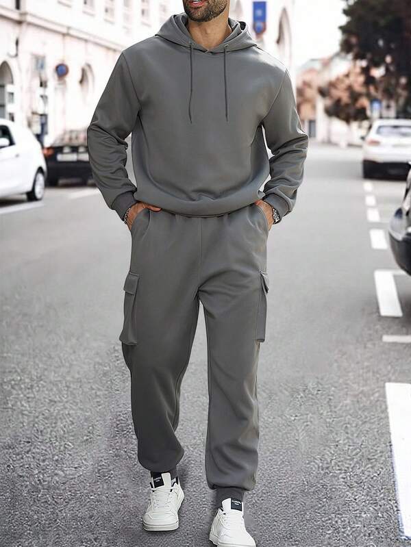 Manfinity Homme Ensemble casual grande taille pour hommes, Sweat-shirt à capuche à manches longues de couleur unie avec cordon de serrage et pantalon cargo. Tenue d'automne