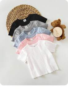 Set de 5 blusas de manga corta con volantes en el bajo y color liso para niñas bebé, compra 1 y llévate 4 gratis, ideal para verano - Blanco y Negro - Ver 2