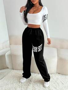 Zolique طقم قطعتين كاجوال للنساء يتكون من ملابس علوية بياقة مربعة وأكمام طويلة وبنطال - الأسود - مشاهدة 5