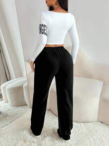 Zolique طقم قطعتين كاجوال للنساء يتكون من ملابس علوية بياقة مربعة وأكمام طويلة وبنطال - الأسود - مشاهدة 2