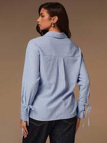 Athîral Women's Light Blue Pinstripe Structured Shirt | Crisp Textured Fabric, Relaxed Straight Fit, Classic Point Collar, Drop Shoulder Long Sleeves With Adjustable Tie-Cuff Detail, Waist Belt With Metallic Buckle & Hidden Metal Snap Closure, Streamlined Minimalist Style For Office, Daily Socializing & Capsule Wardrobe Essentials - Blue - View 2