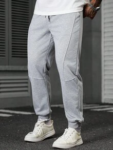 Manfinity CasualCool Pantaloni sportivi casual minimalisti da uomo con vita con cordoncino e tasche inclinate, pantaloni casual e maturi di colore grigio, in tessuto morbido e lavorato a maglia, pantaloni sportivi con tasche, comodi pantaloni sportivi da corsa e fitness, con polsini a costine, joggers grigi da uomo, pantaloni sportivi da uomo grigi