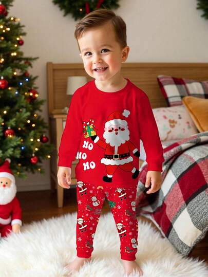 SHEIN Conjunto de pijama de pantalón y top de manga larga con estampado gráfico de temática navideña, ajuste ceñido para niño pequeño, adecuado para otoño/invierno y temporada navideña