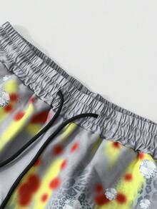 ROMWE MEN Goth Pantaloni della tuta da uomo in stile urban, pantaloni della tuta scuri in stile gotico con stampa di teschi e fiamme, vita con coulisse per comfort regolabile, facili da indossare per uno stile urban