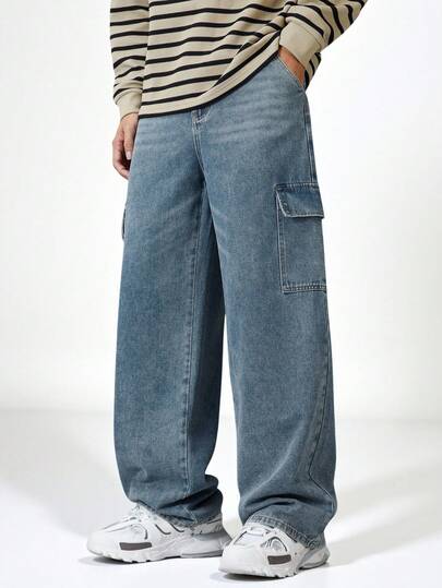 SHEIN Explorewe 青少年男童休闲户外工装牛仔裤，舒适复古中度水洗蓝色做旧松紧腰宽松版型牛仔裤，适合秋冬季节穿着。