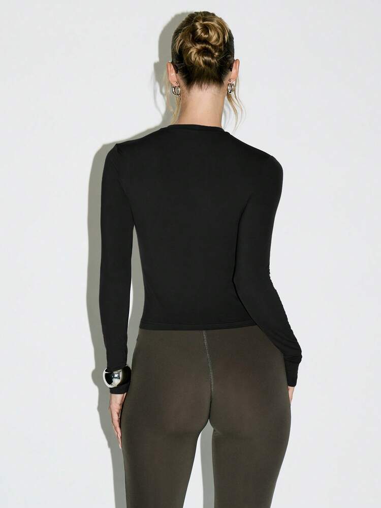 KIZN Seamless Crew Neck Long Sleeve Form Fitting Top