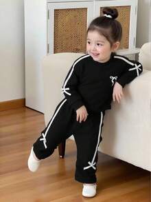 Genkimix Kids 2 件套紫色蝴蝶结运动衫和裤子套装，适合 4-7 岁小女孩，休闲运动套装，秋季 - 黑色 - 查看 1