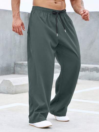 Manfinity Homme Pantalones rectos de cintura con cordón de unicolor holgados para hombres, otoño