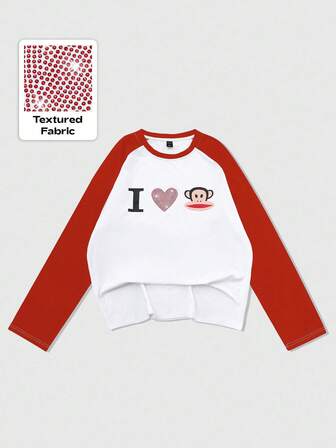 Paul Frank X ROMWE Camiseta de manga larga casual de hombre con estampado de corazón de strass y mono en contraste, otoño