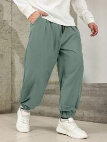 Manfinity Homme Pantalones casuales de unicolor para hombres de talla grande, otoño - verde menta - Ver 3