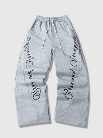 Street Life Pantalon de survêtement ample avec cordon de serrage à la taille, imprimé de lettres et patchwork, pour hommes