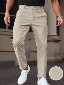 Manfinity Mode 男士商务休闲纯色锥形正装裤，经典米色，时尚百搭，彰显稳重端庄的商务气质。适合日常通勤、商务、聚会和宴会。这款裤子是男士衣橱中不可或缺的百搭单品，也是送给男朋友或老公的绝佳礼物。 - 米色 - 查看 1