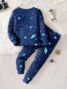 1 conjunto de pijama de manga comprida e calça com estampa de estrela que brilha no escuro e astronauta para menino, outono