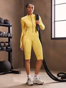 Powerista Bộ đồ liền thân thể thao tay dài raglan màu trơn có khóa kéo nửa vạt kèm quần short cho nữ - Màu vàng - Xem 2