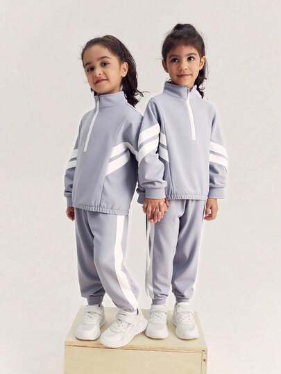 2 件套年轻女孩休闲拼色立领夹克上衣 + 拼色运动裤，适合户外、运动、与外套分层穿着，秋冬