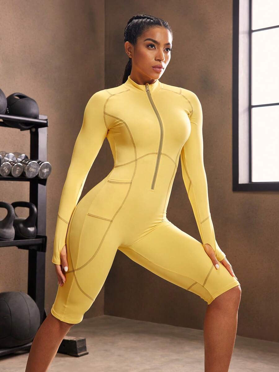 Powerista Bộ đồ liền thân thể thao tay dài raglan màu trơn có khóa kéo nửa vạt kèm quần short cho nữ - Màu vàng - Xem 1