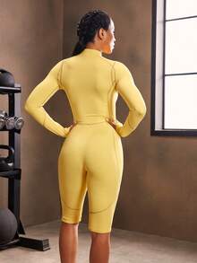 Powerista Bộ đồ liền thân thể thao tay dài raglan màu trơn có khóa kéo nửa vạt kèm quần short cho nữ - Màu vàng - Xem 3