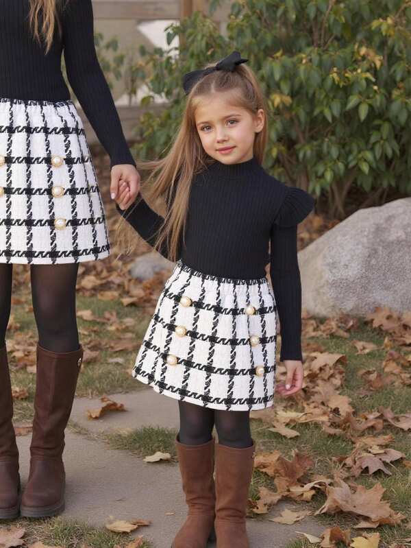 SHEIN 2pcs Young Girl Knitted Solid Color Ruffle Trim T-Shirt And Plaid Skirt Set Girls Black Rib Knit Top And Skirt Set Girls Black And White Checkered Skirt Set Black And White Outfit For Girls Girls Tweed Skirt Set Girls Ribbed Turtleneck Shirt And Skirt Set Girls Black Rib Knit Top And Plaid Skirt Set Black And White Plaid Skirt Set For Girls Girls Black Ruffle Long Sleeve Shirt Girls Winter Two Piece Outfit Girls Tweed Skirt And Top Set,Golden Botton Decor Plaid Skirt Set, Girls Autumn Winter Outfit,Casual Wear,Halloween ,Family Vocation,Mommy & Sisters & Me Matching,Twims Girl,Black, Christmas, School Style Sets Fall