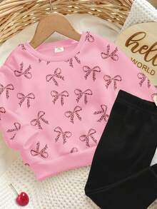 SHEIN Bộ đồ Happikins 2 món gồm áo nỉ dài tay cổ tròn in họa tiết da báo và quần legging, thích hợp cho bé gái mùa thu/đông, mặc thường ngày, quần áo trẻ em in hình, đi học, trang phục mùa thu. Áo nỉ màu hồng cho bé gái tuổi teen, áo len dệt kim màu hồng họa tiết hoa dâm bụt cho bé gái tuổi teen, áo len dệt kim màu hồng có nơ cho bé gái tuổi teen. - Nhiều màu - Xem 2