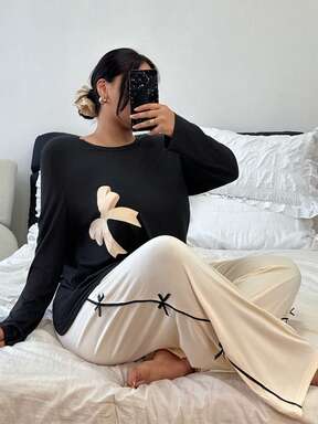 Ensemble pyjama grande taille avec Top à manches longues et pantalon imprimé nœud bicolore. Ensemble pyjama nœud, tenue de détente. Ensemble de détente à manches longues, pyjama noir pour femmes. Tenue confortable, vêtements d'automne et d'hiver