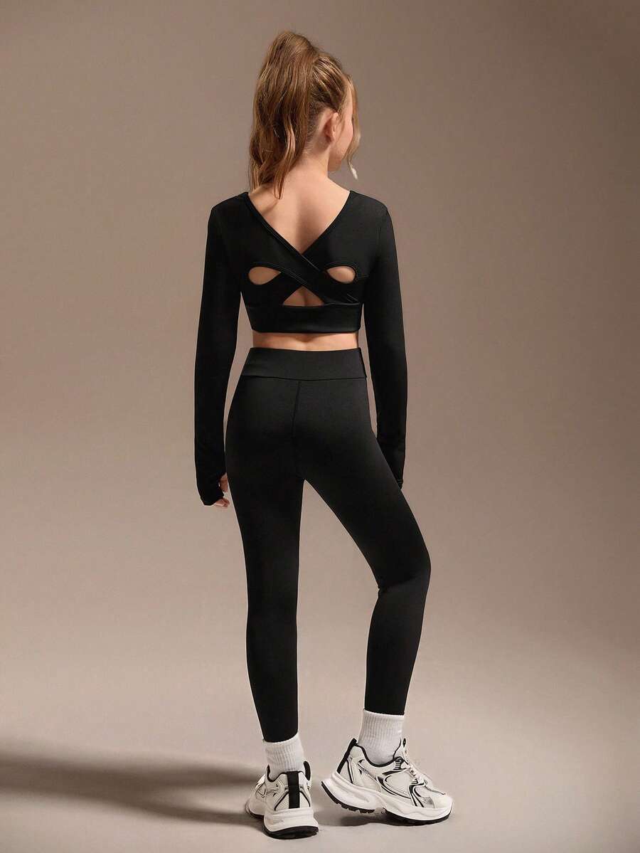 SHEIN Komplet sportowy dla dziewcząt w kolorze czarnym z długim rękawem, obcisły, bardzo elastyczny materiał z wycięciami na plecach w kratkę, odpowiedni do ćwiczeń, jazdy na rowerze, biegania i uprawiania sportu - Czarne - Zobacz 1