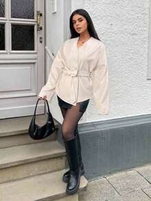 SHEIN EZwear Manteau en laine casual à lacets de couleur abricot grande taille, style élégant pour l'automne. Cardigan enveloppant pour femmes, cardigan ceinturé