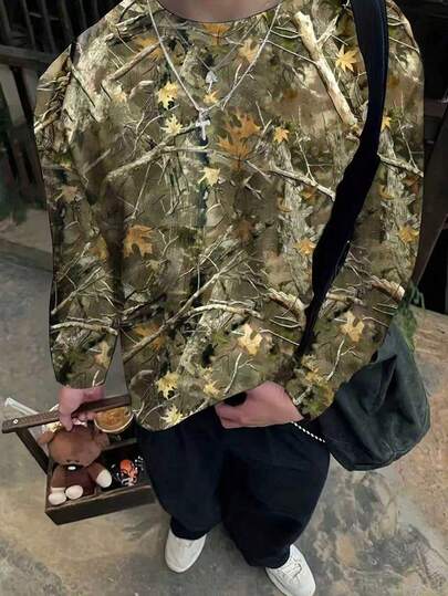 Manfinity Dauomo Camiseta de manga larga casual y holgada con cuello redondo y estampado de ramas para hombre, otoño