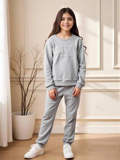 SHEIN Conjunto informal de sudadera holgada con estampado gráfico de letra y pantalón de chándal para niña preadolescente