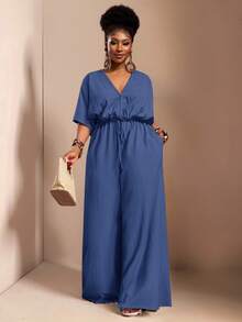 Veslaya Hàng mới về Thu Đông, Quần áo Thu/Đông nữ, Halloween, Lễ hội âm nhạc, Lễ Phục Sinh, Phong cách miền Tây, Phong cách du mục, Tiệc sinh nhật, Lễ tốt nghiệp, Trang phục học sinh, Thường ngày, Kỳ nghỉ, Du lịch tàu biển, Bãi biển, Tắm nắng, Thời trang, Bộ áo liền quần ống rộng màu trắng có họa tiết dành cho nữ cỡ lớn, eo rộng, ống đứng. - Màu xanh hải quân - Xem 12