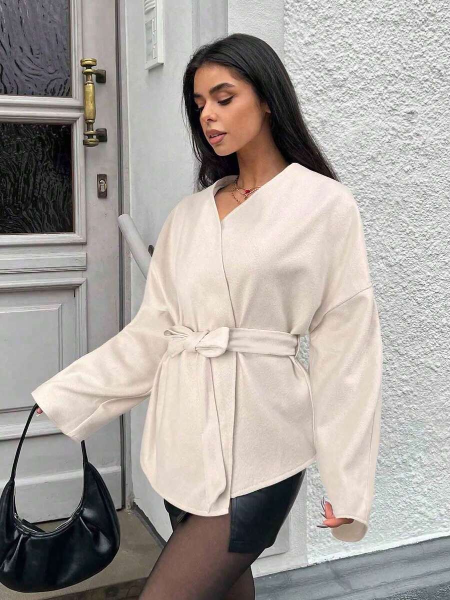 SHEIN EZwear Manteau en laine casual à lacets de couleur abricot grande taille, style élégant pour l'automne. Cardigan enveloppant pour femmes, cardigan ceinturé