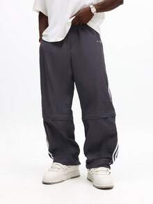 SUMWON 宽松版型运动裤，侧条纹设计，适合休闲街头服饰