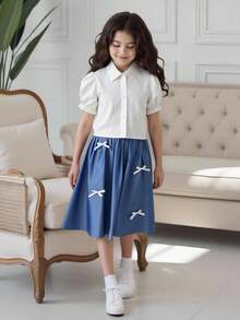 SHEIN 2 Pieces Set For Tween Girl: White Puff Sleeve Shirt Paired With Comfortable Denim Effect Bow Strap Jumper Dress, Suitable For Daily Casual Wear - Blue and White - View 3