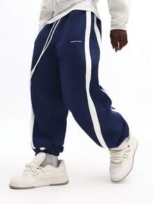 SUMWON Baggy Fit Cuffed Track Jogger Sweatpants With Cut And Sew Side Panels For Casual Comfort