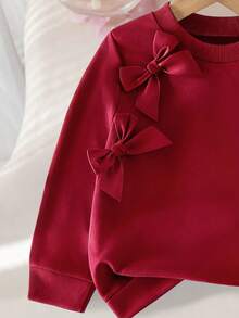 SHEIN Genkimix Kids 2 件女童休闲甜美圆领灯笼袖宽松纯色蝴蝶结运动衫和松紧腰直筒牛仔裤套装，适合返校季 - 酒紅色 - 查看 7