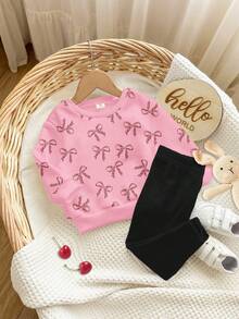 SHEIN Bộ đồ Happikins 2 món gồm áo nỉ dài tay cổ tròn in họa tiết da báo và quần legging, thích hợp cho bé gái mùa thu/đông, mặc thường ngày, quần áo trẻ em in hình, đi học, trang phục mùa thu. Áo nỉ màu hồng cho bé gái tuổi teen, áo len dệt kim màu hồng họa tiết hoa dâm bụt cho bé gái tuổi teen, áo len dệt kim màu hồng có nơ cho bé gái tuổi teen. - Nhiều màu - Xem 3