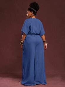 Veslaya Hàng mới về Thu Đông, Quần áo Thu/Đông nữ, Halloween, Lễ hội âm nhạc, Lễ Phục Sinh, Phong cách miền Tây, Phong cách du mục, Tiệc sinh nhật, Lễ tốt nghiệp, Trang phục học sinh, Thường ngày, Kỳ nghỉ, Du lịch tàu biển, Bãi biển, Tắm nắng, Thời trang, Bộ áo liền quần ống rộng màu trắng có họa tiết dành cho nữ cỡ lớn, eo rộng, ống đứng. - Màu xanh hải quân - Xem 2