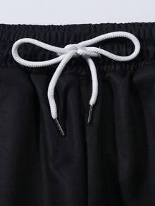 ROMWE MEN Street Life Pantaloni da uomo con gamba dritta e stampa di personaggi dei cartoni animati alla moda - Multicolore - Visualizzare 4
