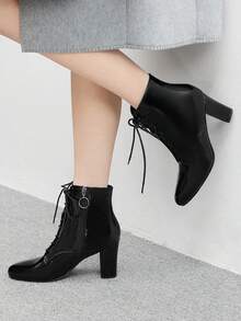 CUCCOO BIZCHIC Giày bốt cao cổ buộc dây bằng da bóng dành cho nữ - màu đen - Xem 1
