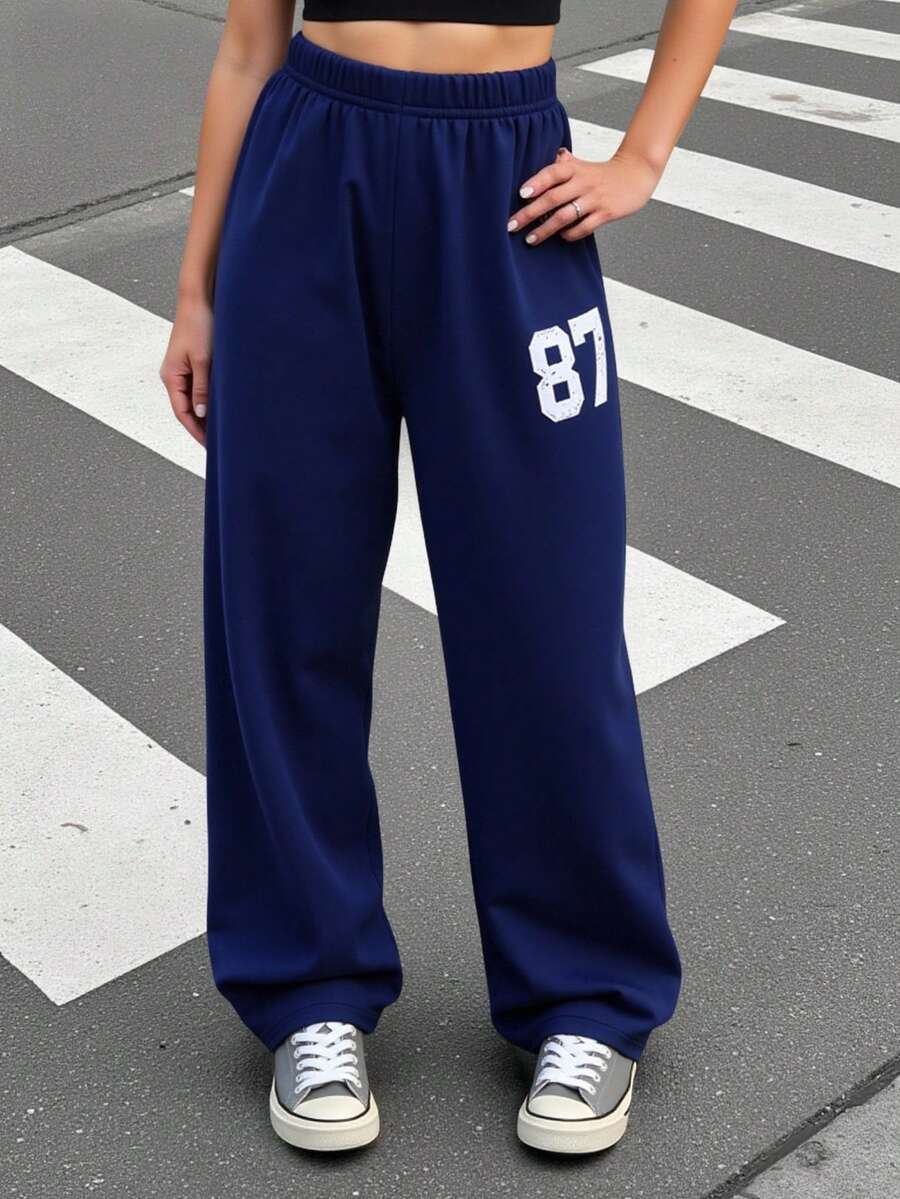 Pantalones deportivos sueltos con gráficos decorativos para adolescentes y niñas, de ajuste relajado para entrenamiento y uso casual, adecuados para otoño e invierno