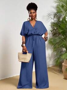 Veslaya Hàng mới về Thu Đông, Quần áo Thu/Đông nữ, Halloween, Lễ hội âm nhạc, Lễ Phục Sinh, Phong cách miền Tây, Phong cách du mục, Tiệc sinh nhật, Lễ tốt nghiệp, Trang phục học sinh, Thường ngày, Kỳ nghỉ, Du lịch tàu biển, Bãi biển, Tắm nắng, Thời trang, Bộ áo liền quần ống rộng màu trắng có họa tiết dành cho nữ cỡ lớn, eo rộng, ống đứng. - Màu xanh hải quân - Xem 5