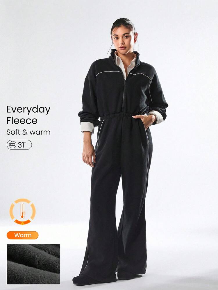 31" Mono de tela polar suave y ligero con cremallera frontal, rayas de contraste, bolsillos laterales y efecto levantador de glúteos, para uso diario y casual en otoño e invierno