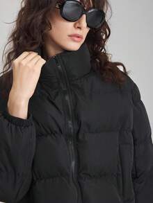 Ontre معطف طويل الأكمام بياقة عالية ذو لون أحادي، تصميم بسيط وعصري للنساء، ملابس كاجوال للمكتب والأعمال، طراز أنيق وهادئ، مناسب للارتداء اليومي والتنقل الحضري، مصنوع من خامات عالية الجودة مناسب للخريف والشتاء